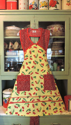 Cherry apron with yellow polka dots